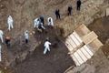 Drone-footage-shows-mass-grave-in-new-yorks-hart-island-1-thum (1).jpg